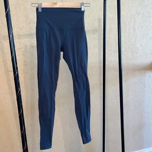 Lululemon leggings. Worn and washed a few times. Size 6. Skate grey/blue.